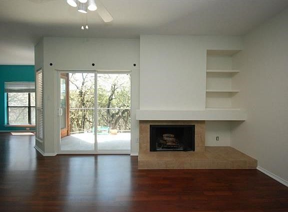 Wood burning fireplace - built in bookshelves