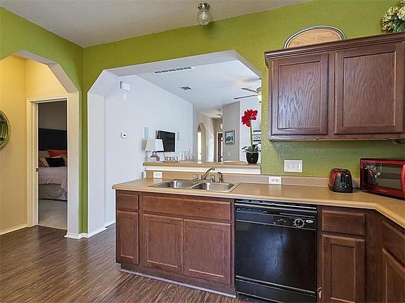 Peeking into master bedroom and living room.