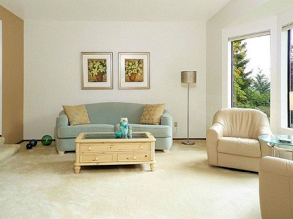 Large living room with a territorial view of the hills and mountains.