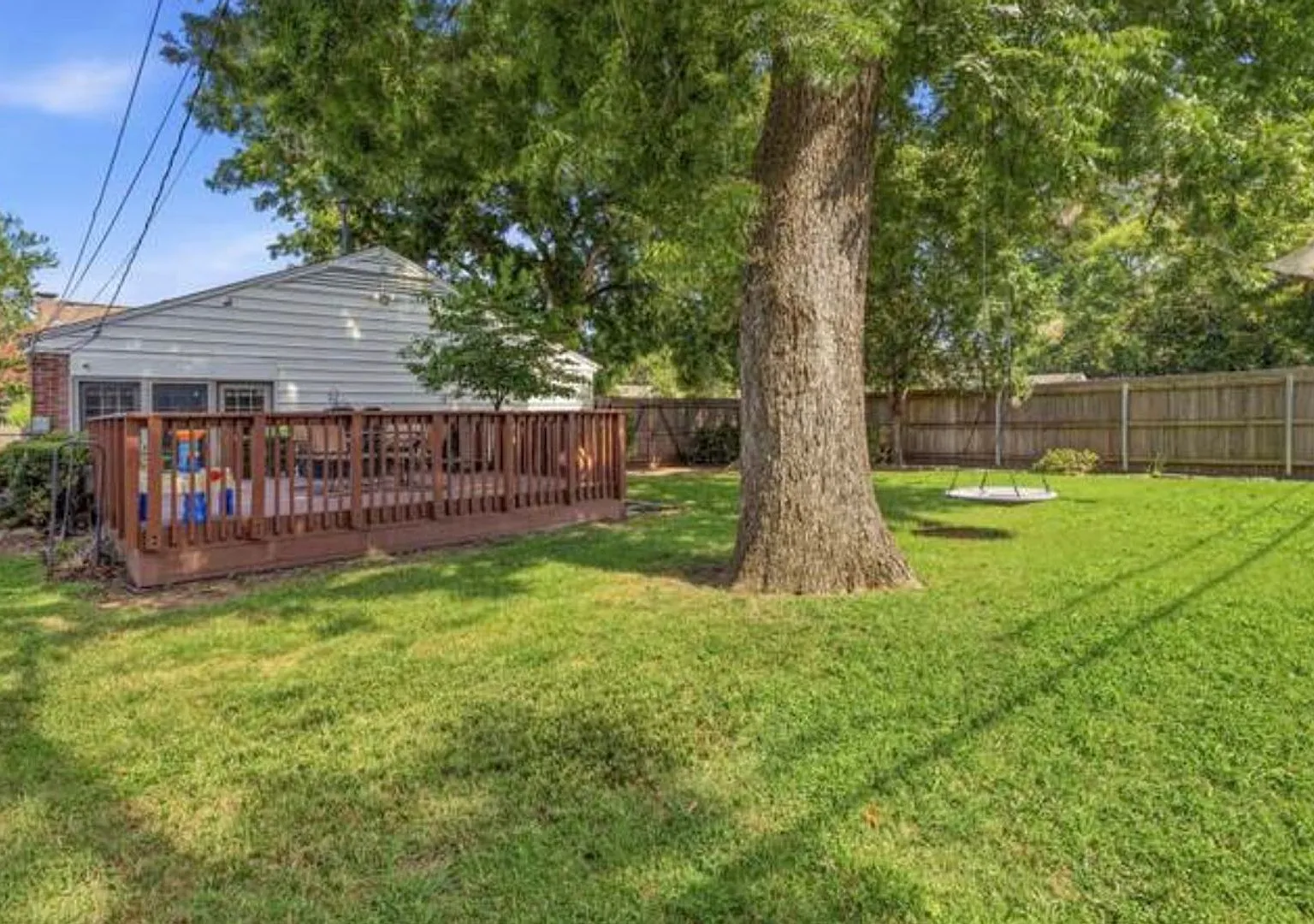 This home features 2 bedrooms, 1.5 baths and sits on a spacious corner lot in a prime Tulsa location — Photo 3