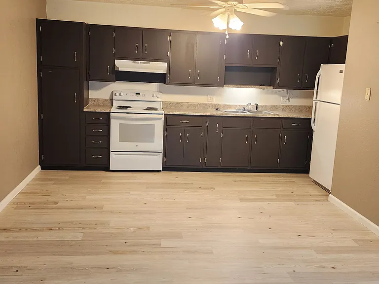 Large Kitchen - New Flooring, Lots of Cabinets and Newer Appliances