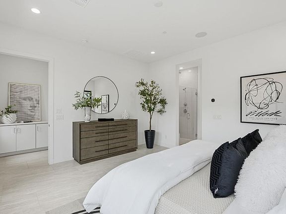 Beautiful primary bedroom suite with ample natural light