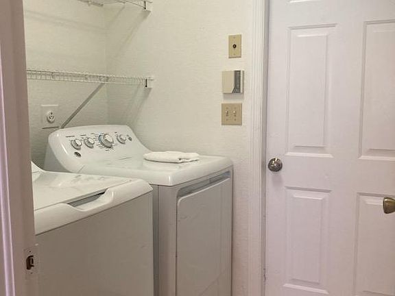 Laundry with washer and dryer.