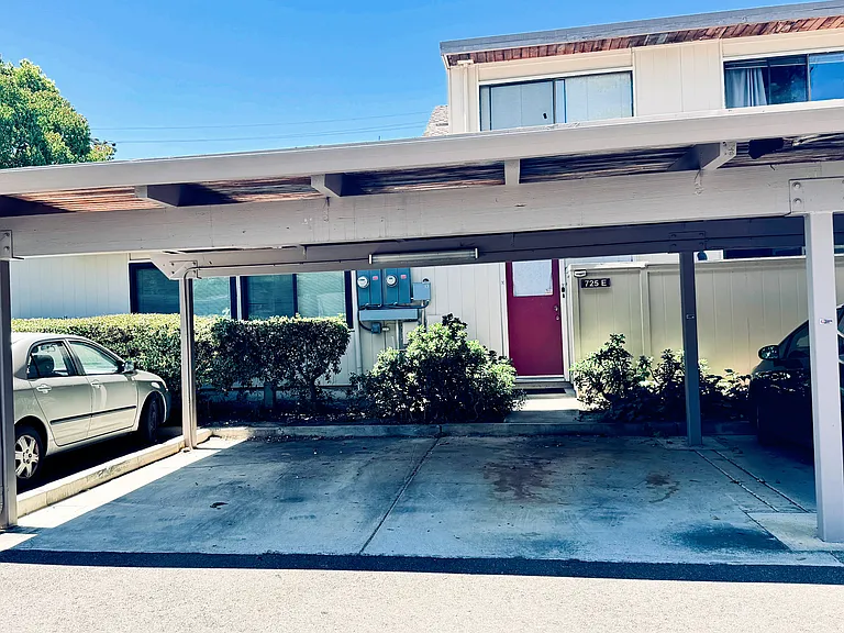 Carport next to unit, two spots