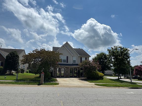Corner lot near the school bus stop.