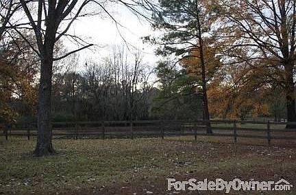 Land & Pond
						:
						Plenty of land to spread out. Property includes a stocked pond.