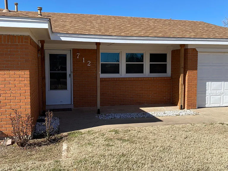 Front door view. This house has a crisp, clean, and cozy vibe we know anyone would enjoy.