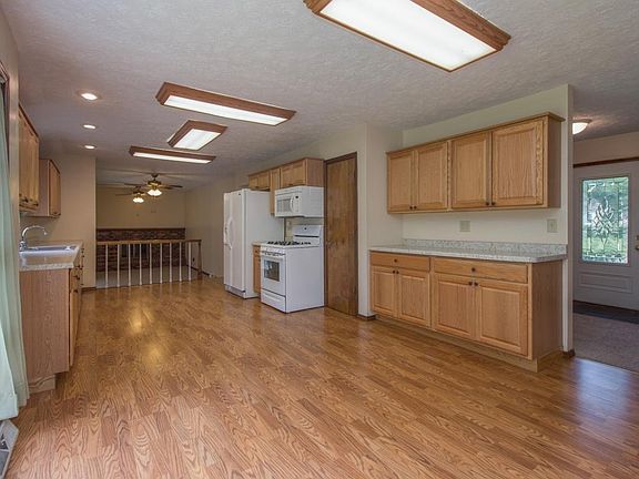 Kitchen is beautifl, functional, and open to the family room.