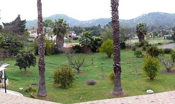 view of yard & hills