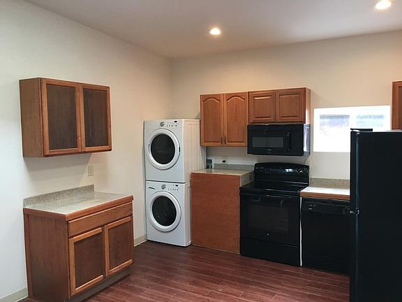 Kitchen with washer & dryer.