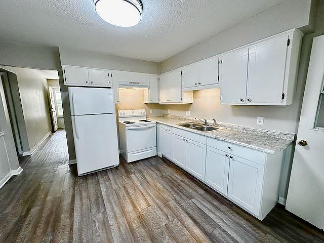 Large Kitchen with all new appliances and room for eat-in table.