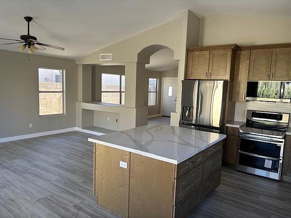 Kitchen over looking living room and family room