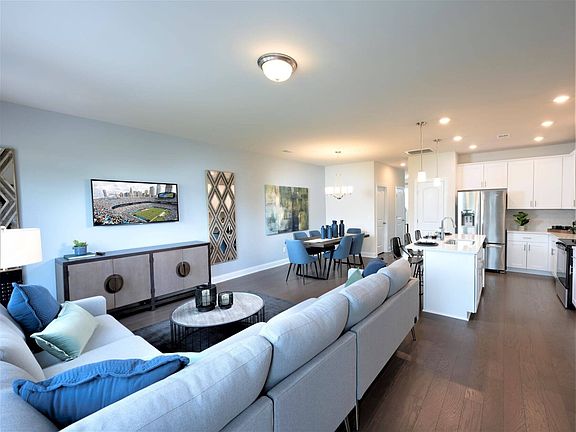 The open-concept living area offers the perfect space to entertain friends and family.