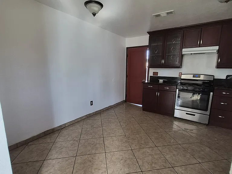 Kitchen-granite tops, stove included, range

Dinning space