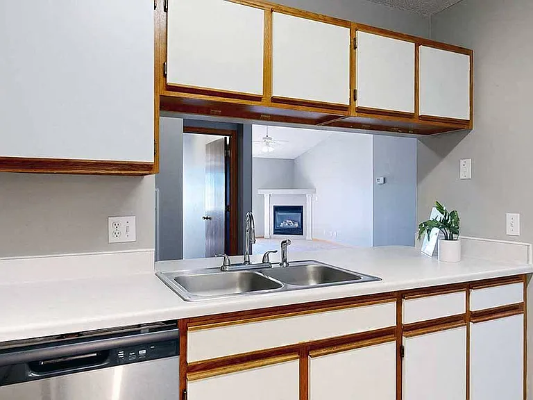 Kitchens in our Glacier homes feature an opening into the living room.