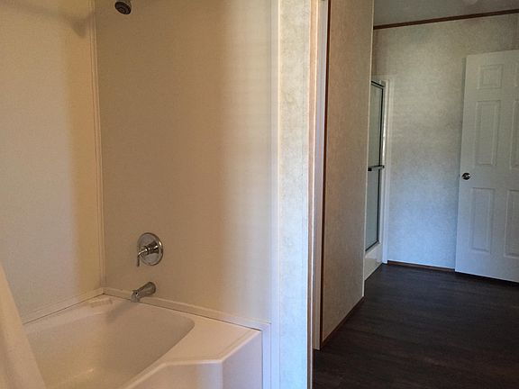 large soaker tub and seperate shower in master with double v