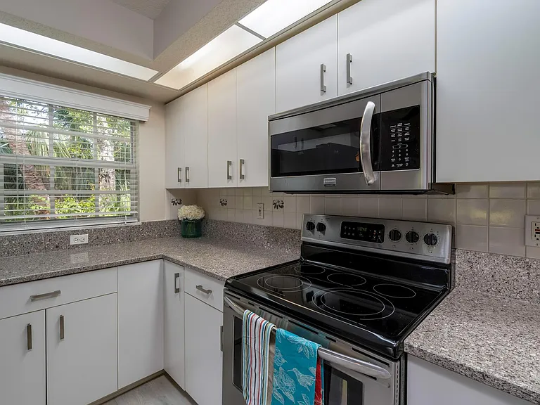 Large kitchen with quartz counters