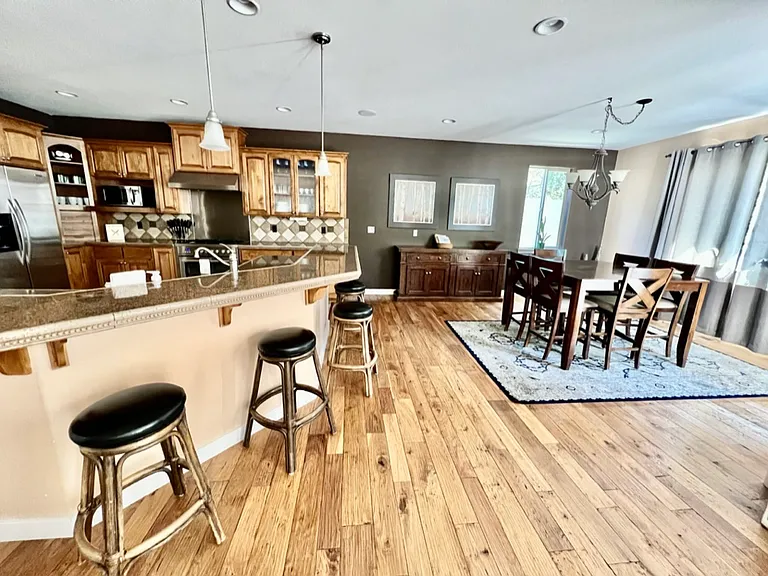 Large kitchen counter with seating. Large pantry.
