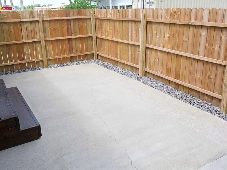Fenced in backyard patio