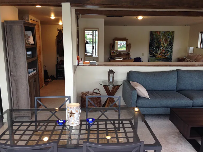 View of bedroom from living room - half wall allows views, views, views
