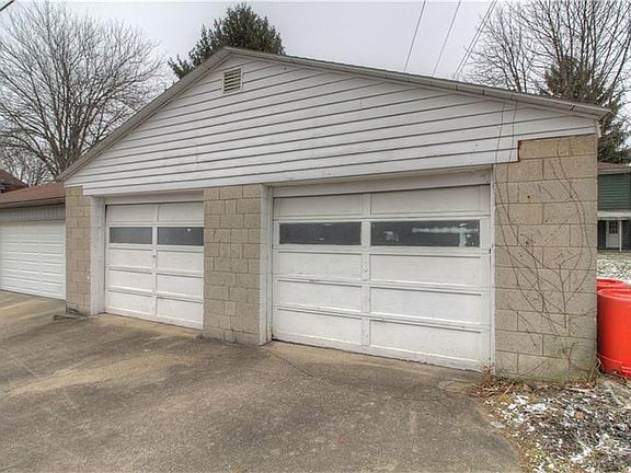Full, two-sized garage with concrete pad access from the alley.