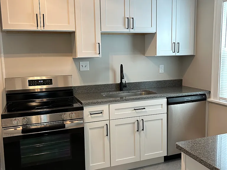 Kitchen, new cabinets, countertops, sink, faucet, flooring and appliances
