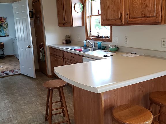 Kitchen into laundry/mud room