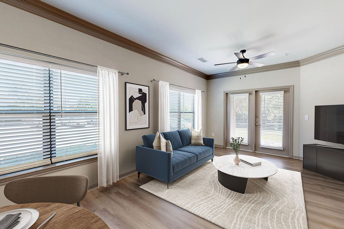 Newly Renovated Living Room with Gorgeous Hardwood-Style Flooring