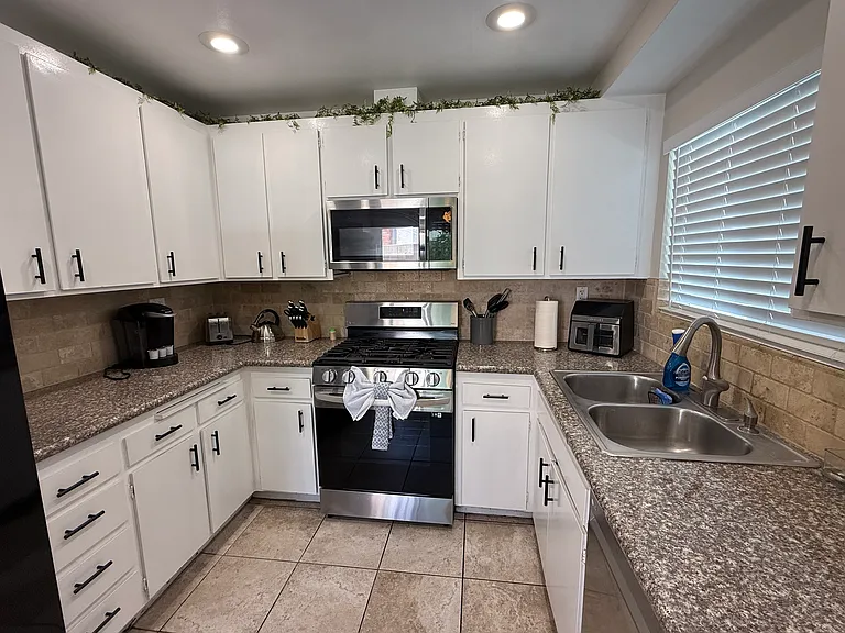 Kitchen with granite countertops. All appliances are included.