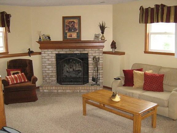Family Room with Fireplace, New Carpet & Sliders to Patio!!