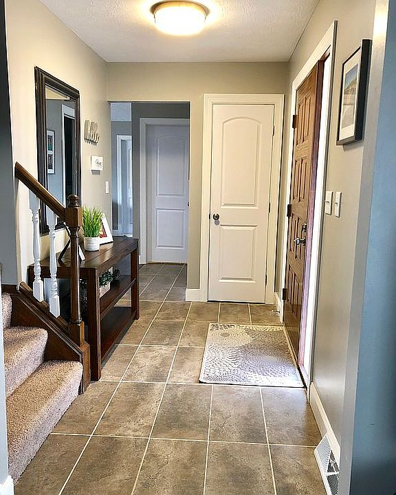 Welcoming entry, new tile