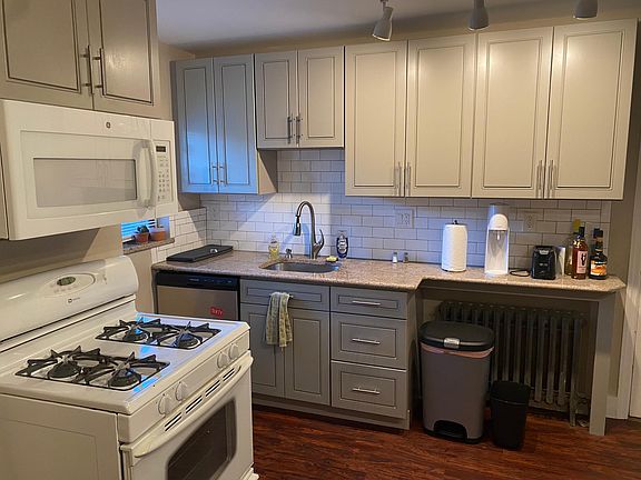 extra tall cabinets provide additional storage space