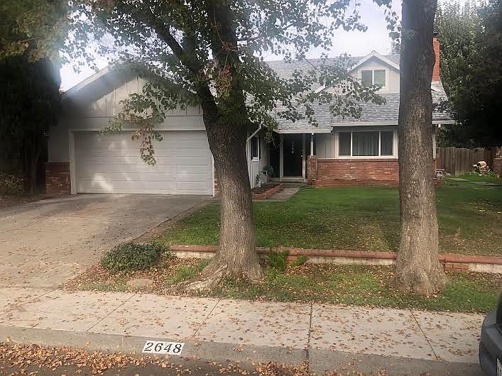 Street front view, 2 car garage with opener
