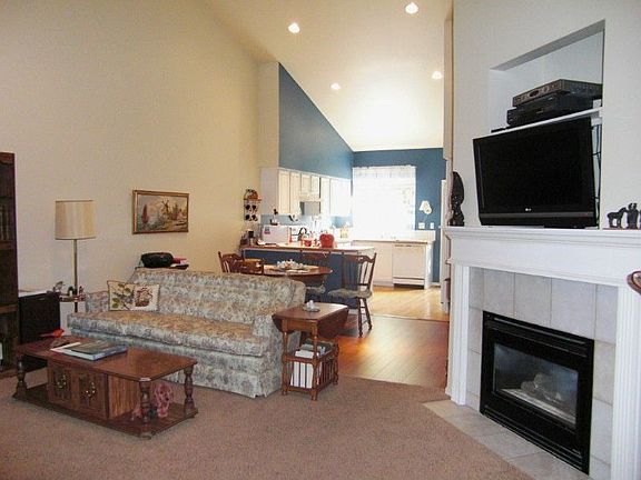 Vaulted Ceilings with fan, gas fireplace and a nice open floor concept for easy living.