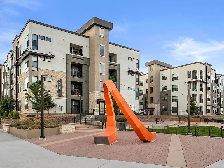 Contemporary Apartment Exterior with Outdoor Sculpture