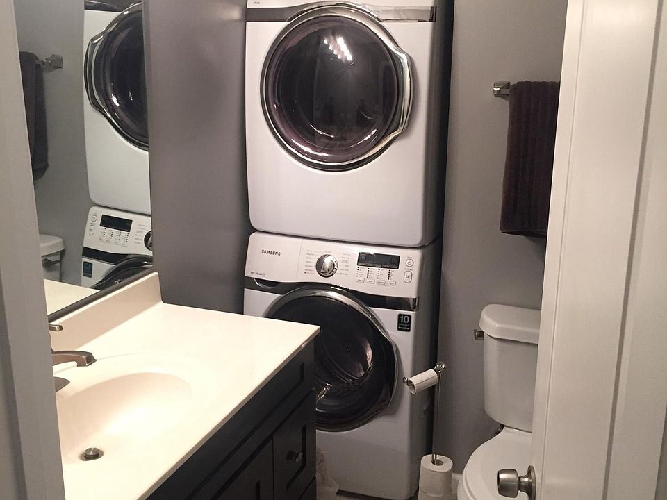 Master bath with washer and dryer in unit