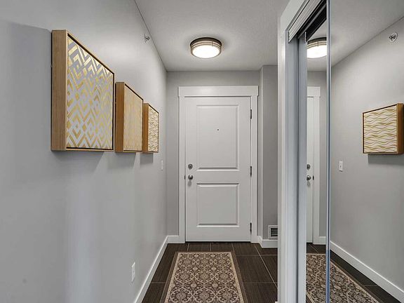 2nd image of 11 Mahogany Row SE #1410