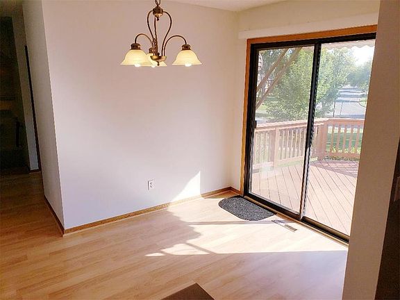 Light-filled dining room with walk-out to the deck