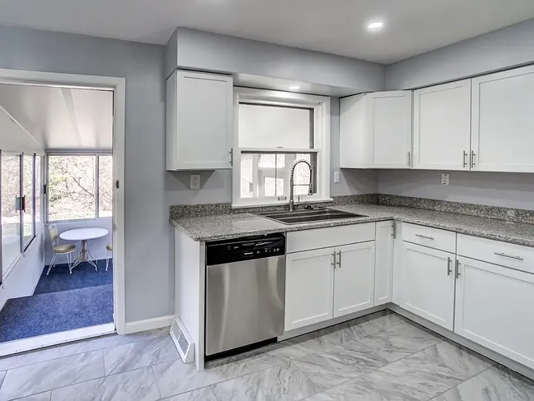 Enclosed patio off kitchen