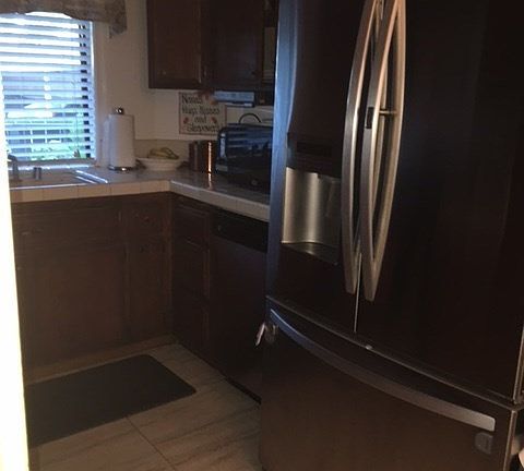 Kitchen with tile countertops