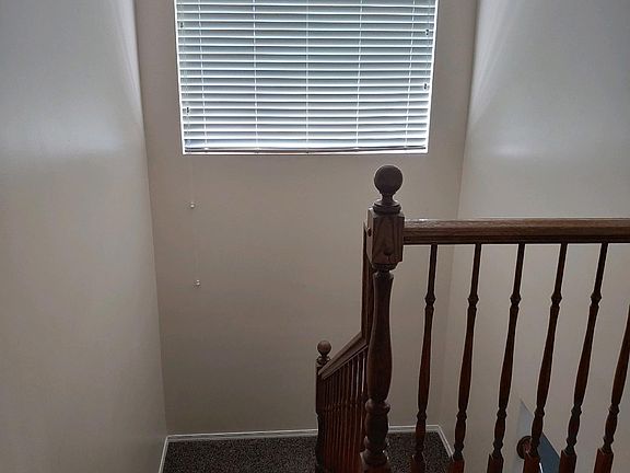 Stairway between main floor and upstairs.