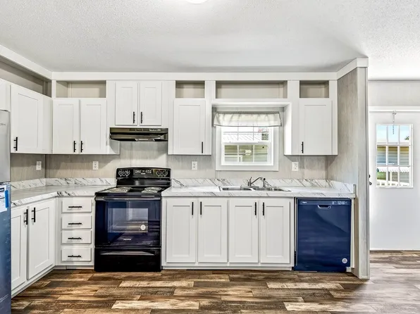 421 Kumquat Dr, Barefoot Bay, FL 32976