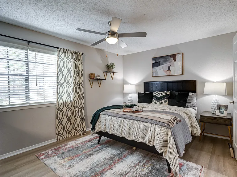 Newly Renovated Bedroom with Hardwood-Style Flooring