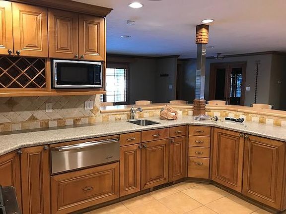 Kitchen with warming drawer, separate prep sink and wine rack