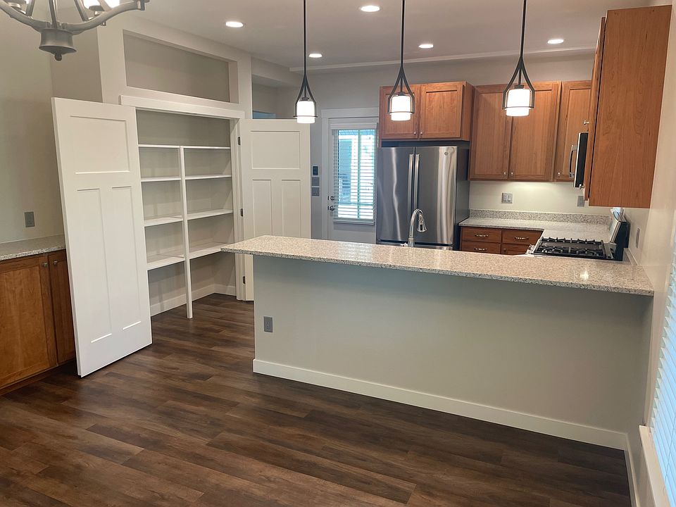 Kitchen and pantry. Solid cherry cabinets and quartz counter tops.