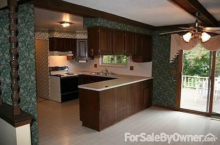 Kitchen
						:
						Lots of counter space, plenty of cupboards and large attached dining area.