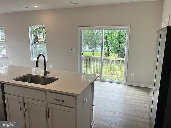 Eat In Kitchen with Quartz Counters