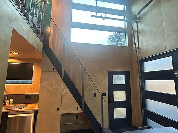 Lots of light with full coverings for all but one high window
