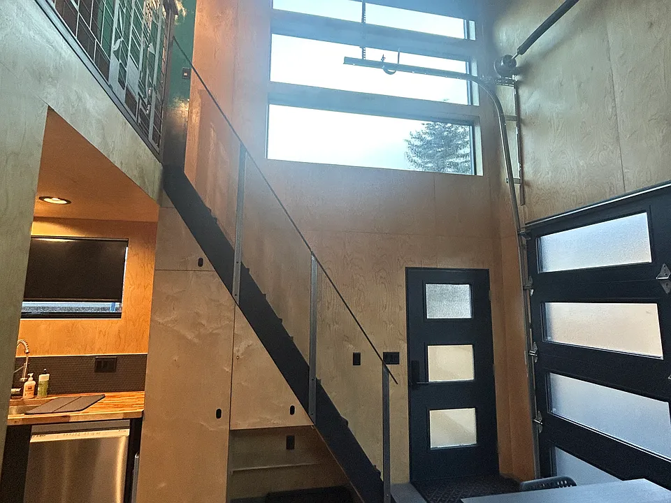 Lots of light with full coverings for all but one high window