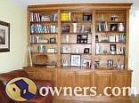 beautiful custom built ins in library, lots of great storage!!